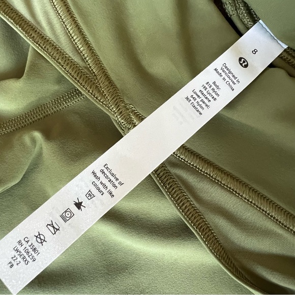 NWT Lululemon Nulu and Crisscross Mesh Stirrup Tight Leggings, Bronze Green - Picture 13 of 15